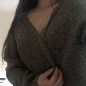 green knitted cardigan